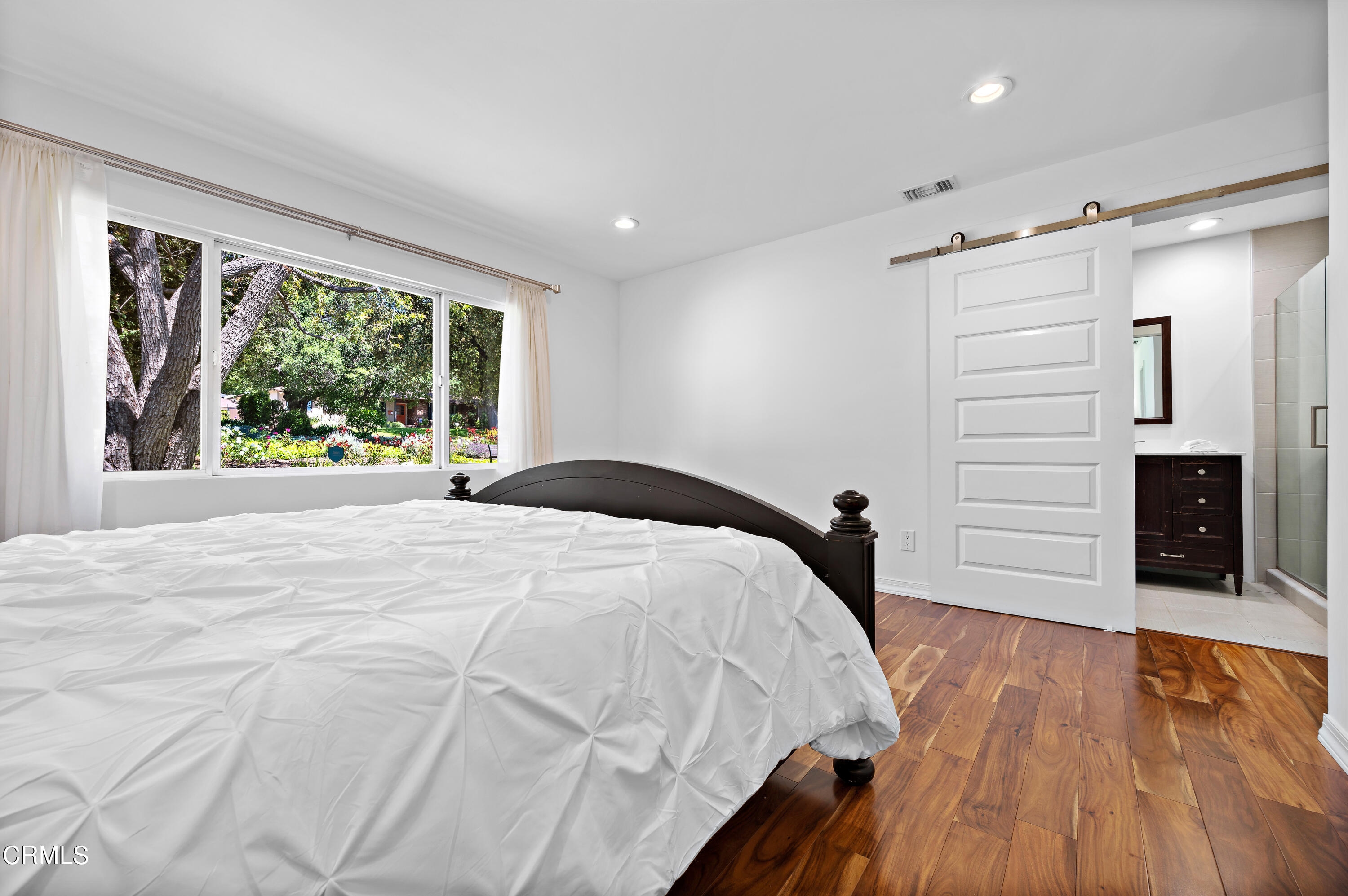 3770 Shadow Grove Road Pasadena, CA 91107 - Photo 26 of 61 a bedroom with a bed and a large window