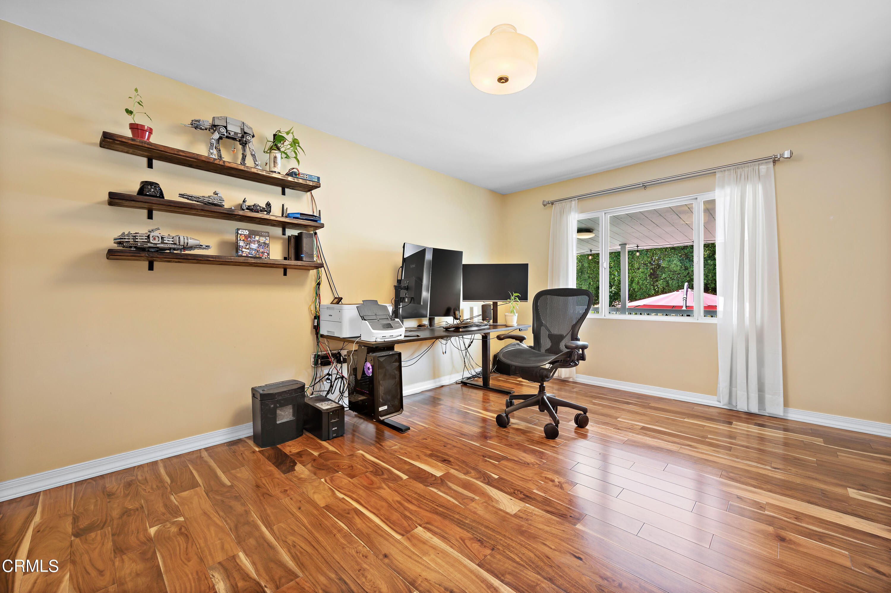 3770 Shadow Grove Road Pasadena, CA 91107 - Photo 33 of 61 a view of a workspace with furniture and a window