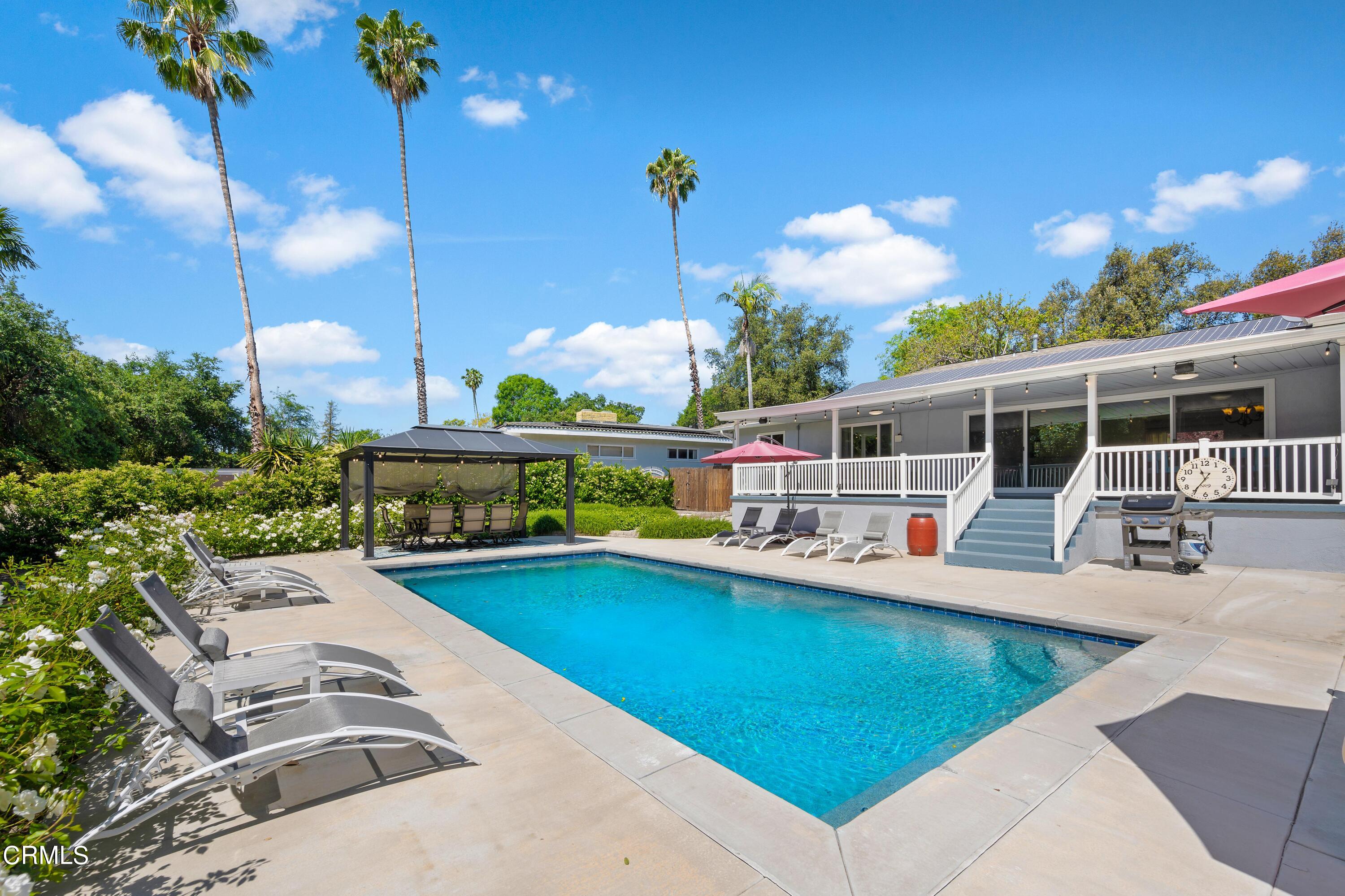 3770 Shadow Grove Road Pasadena, CA 91107 - Photo 38 of 61 a view of a swimming pool with outdoor seating