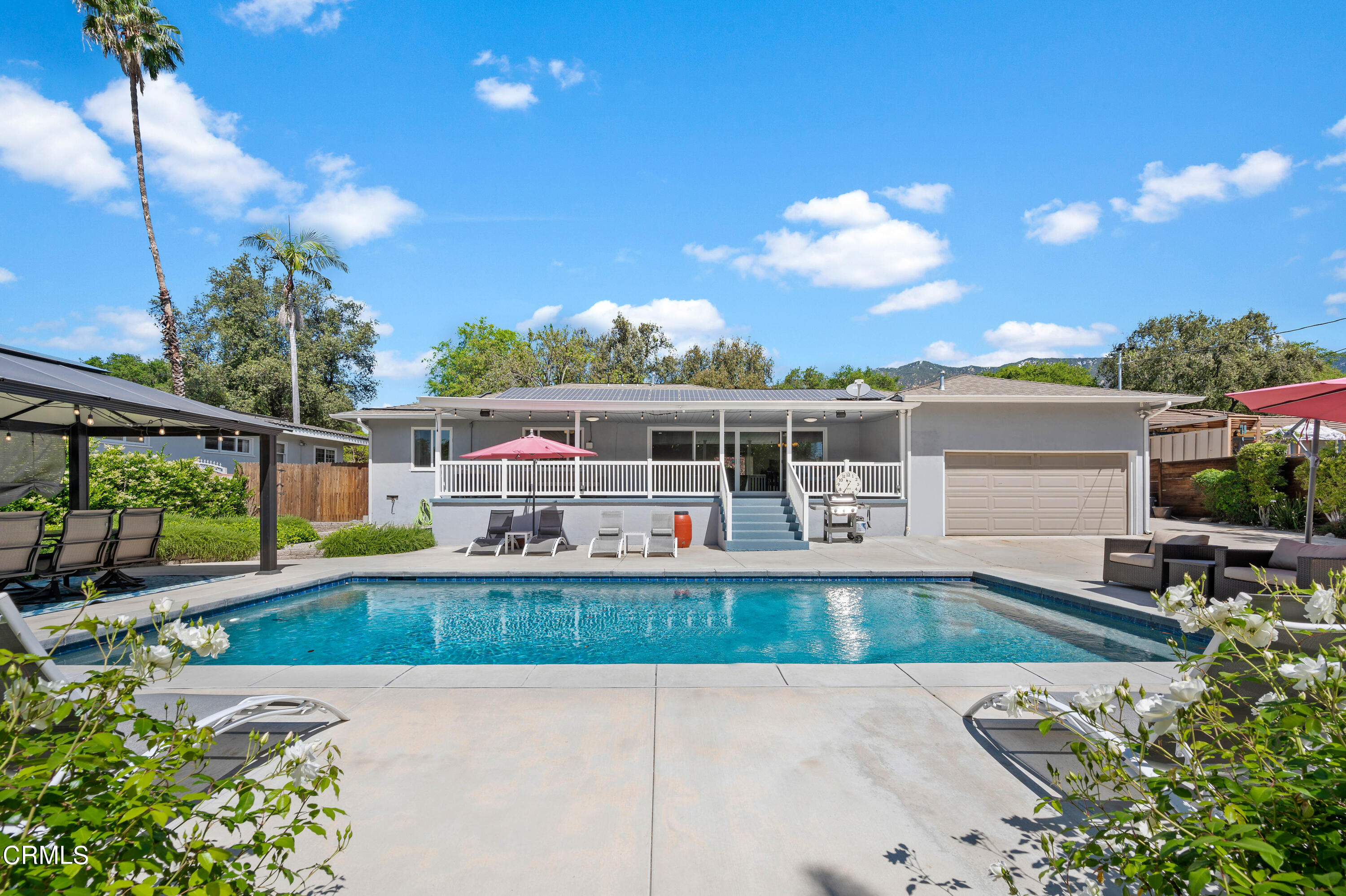 3770 Shadow Grove Road Pasadena, CA 91107 - Photo 40 of 61 swimming pool view with a seating space and garden view