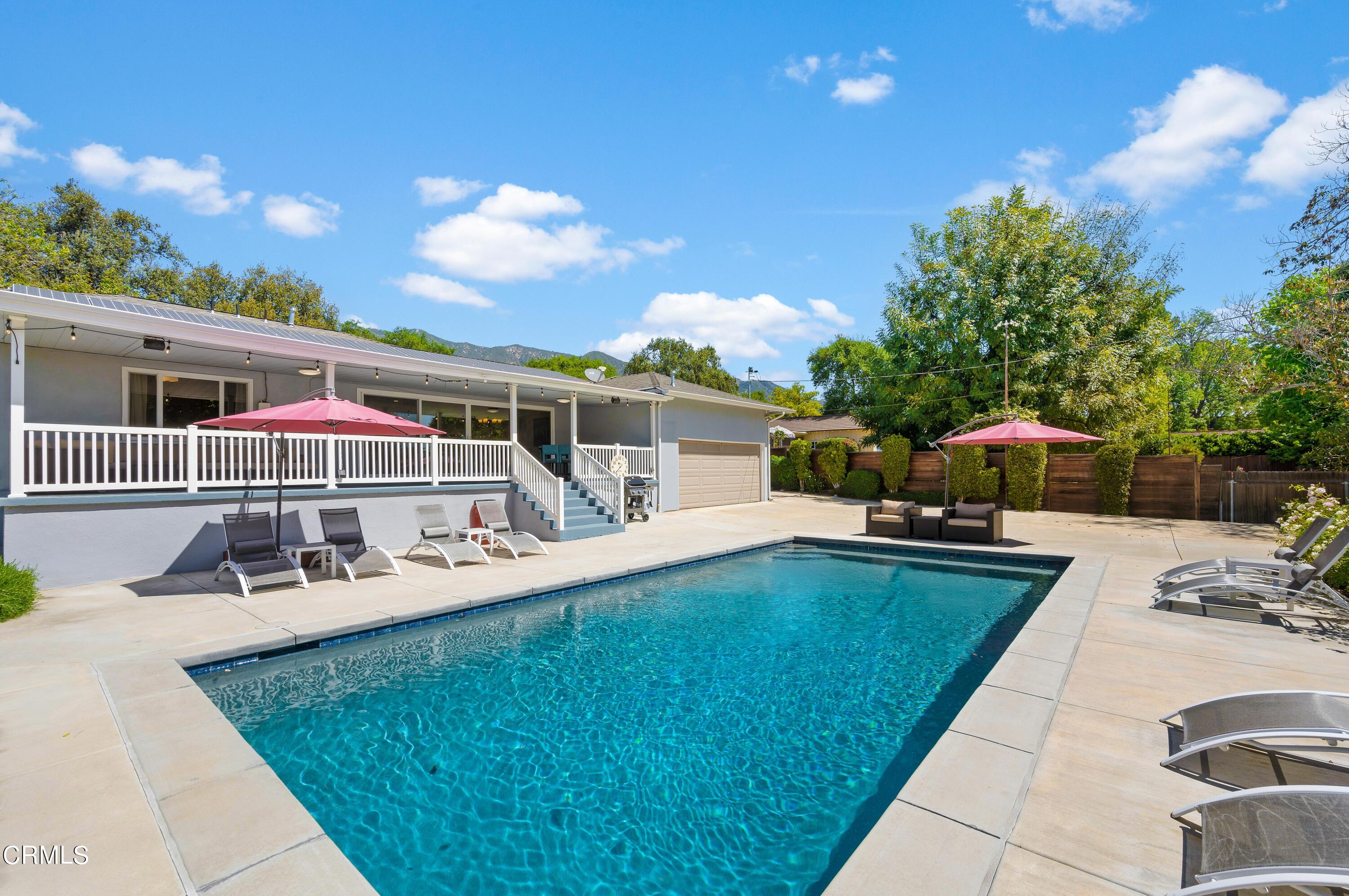 3770 Shadow Grove Road Pasadena, CA 91107 - Photo 42 of 61 a view of a swimming pool with a patio