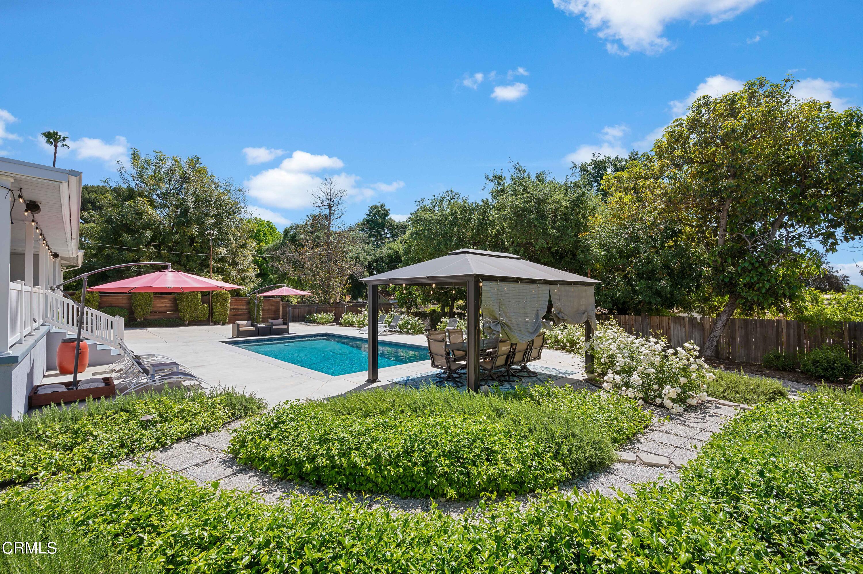 3770 Shadow Grove Road Pasadena, CA 91107 - Photo 43 of 61 a view of a house with a yard and sitting area
