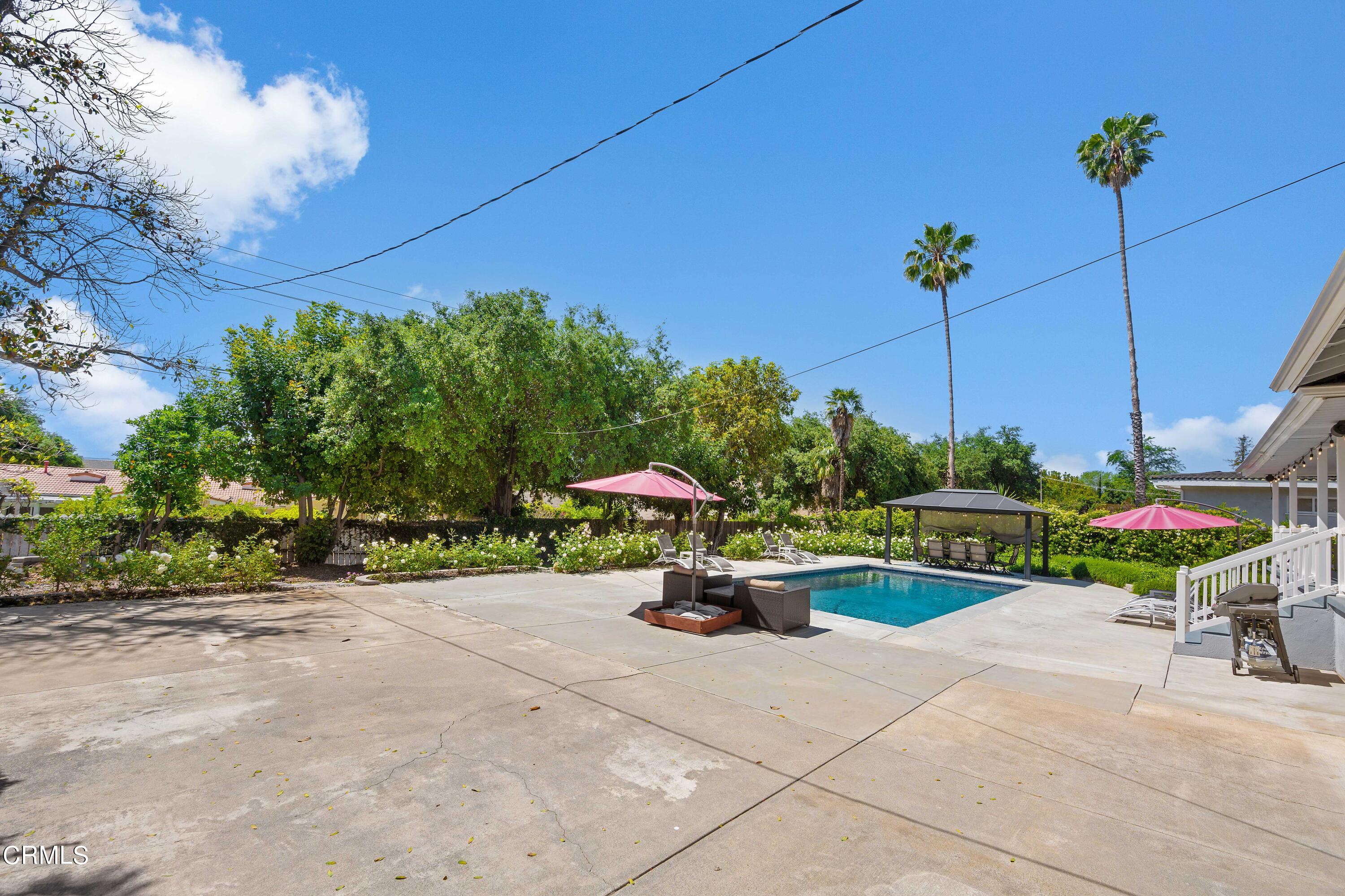 3770 Shadow Grove Road Pasadena, CA 91107 - Photo 44 of 61 a view of a chair and table in the garden