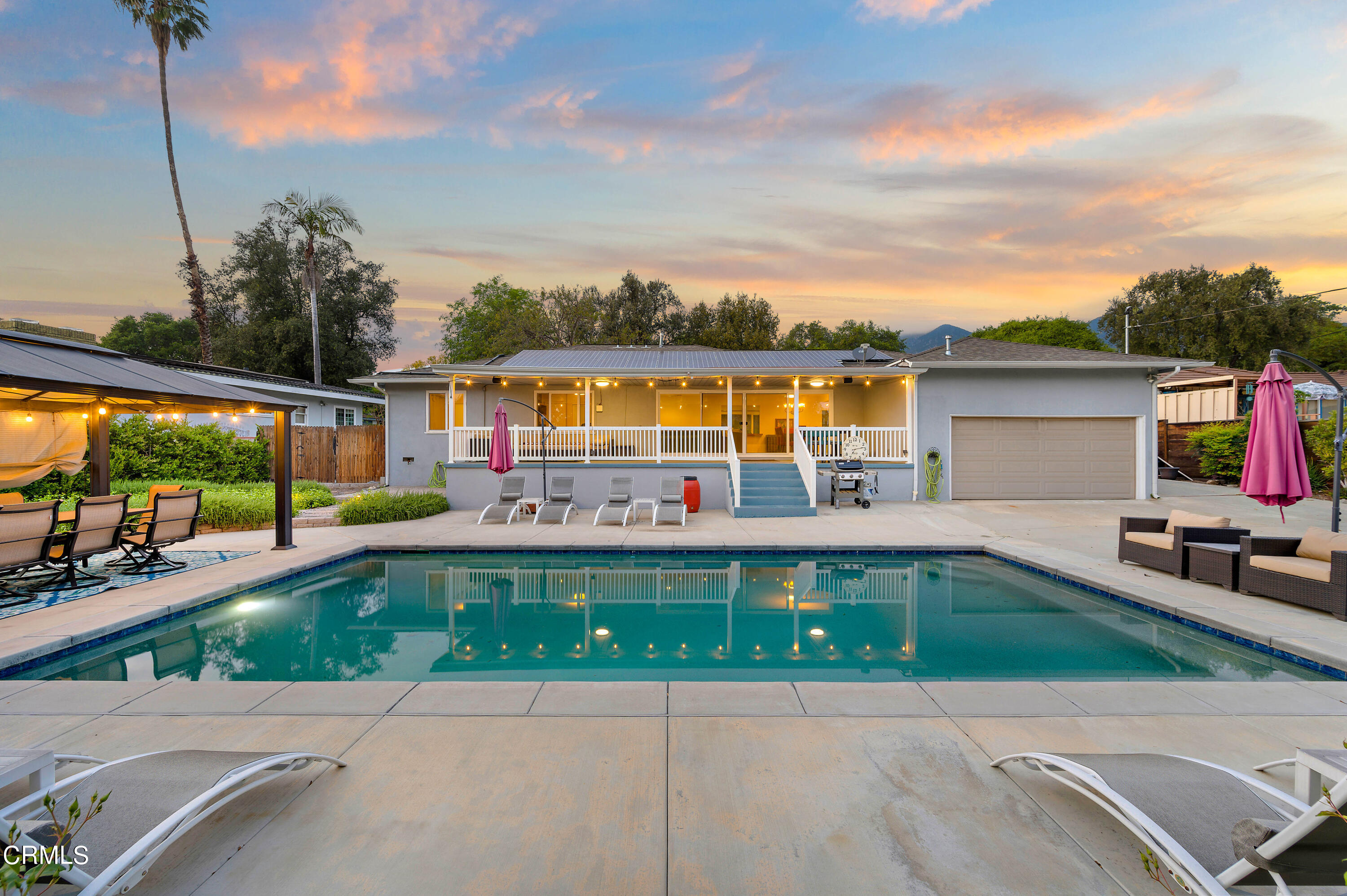 3770 Shadow Grove Road Pasadena, CA 91107 - Photo 52 of 61 a view of a patio with a table and chairs