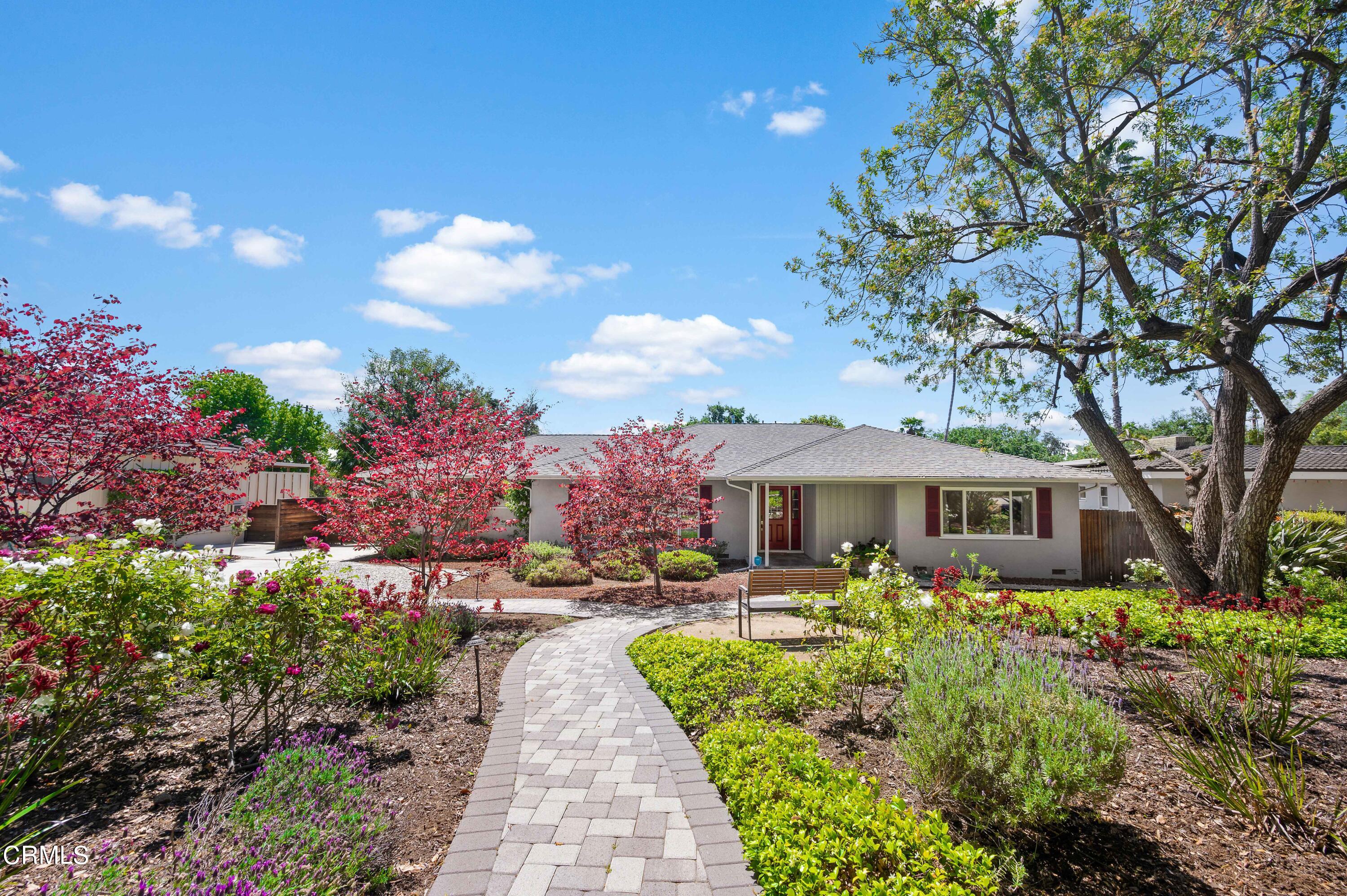 3770 Shadow Grove Road Pasadena, CA 91107 - Photo 6 of 61 a front view of a house with a yard and fountain