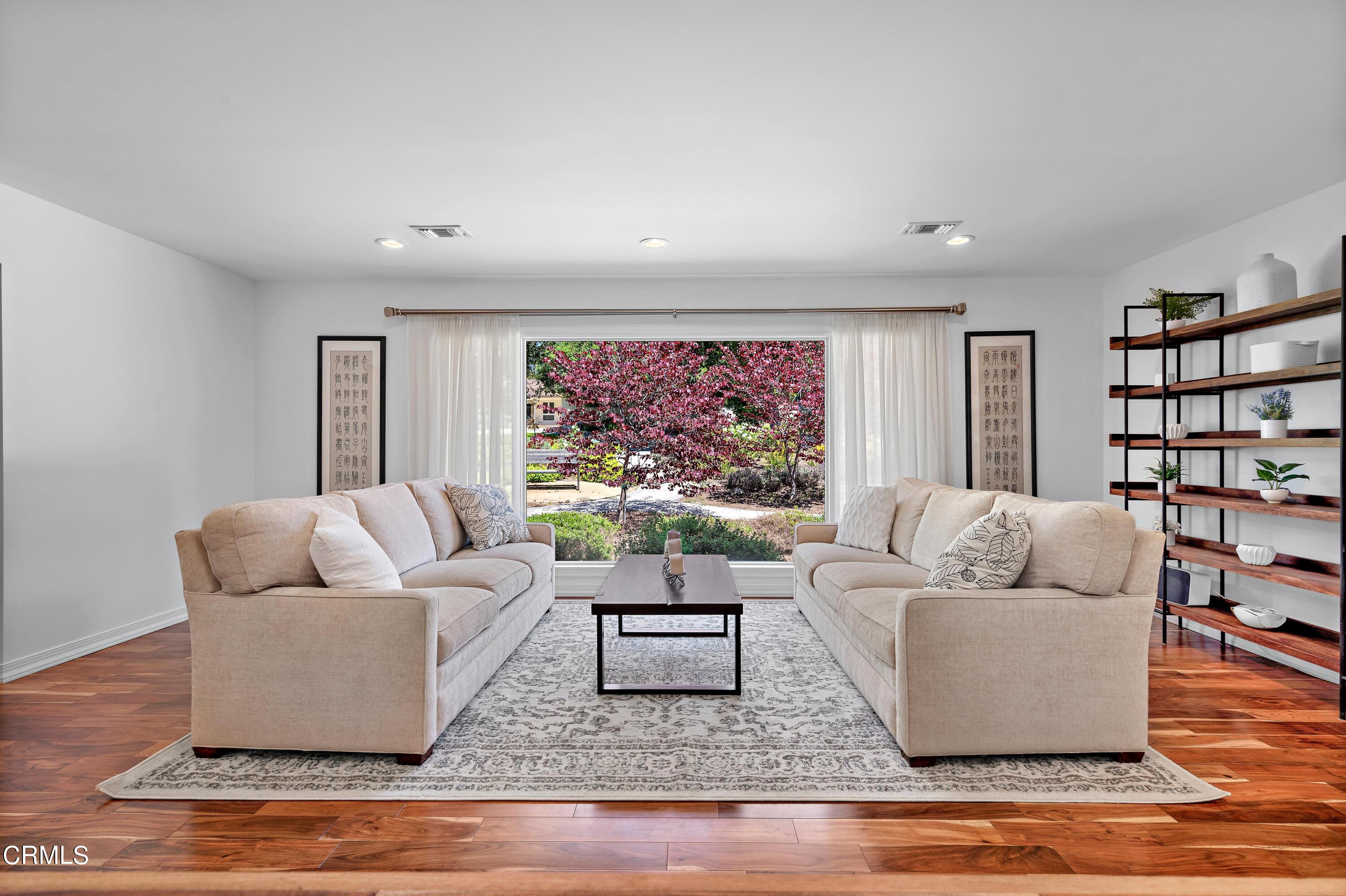 3770 Shadow Grove Road Pasadena, CA 91107 - Photo 10 of 61 a living room with furniture and a flat screen tv