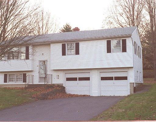 11 Eleanor Road Seymour, CT 06483 - Photo 1 of 1 a front view of a house with a yard and garage