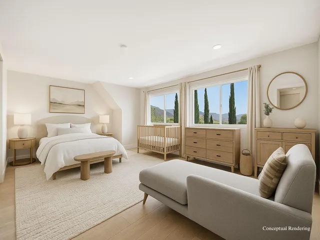 a bedroom with furniture and a couch