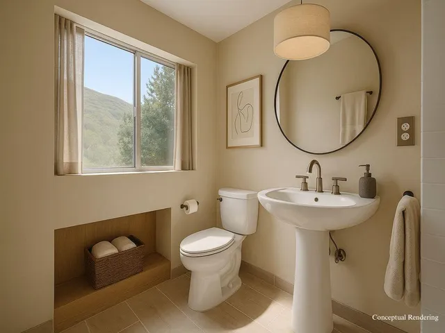a bathroom with a sink a toilet and a mirror