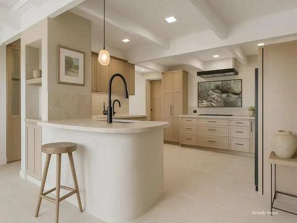 a kitchen with stainless steel appliances granite countertop a sink and wooden cabinets