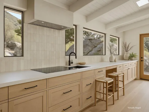 a kitchen with stainless steel appliances granite countertop wooden cabinets a sink and dishwasher with wooden floor