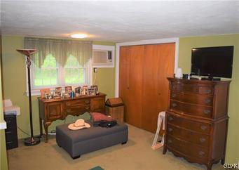 1256 Fox Gap Road Bangor, PA 18013 - Photo 8 of 10 a room with furniture and a flat screen tv