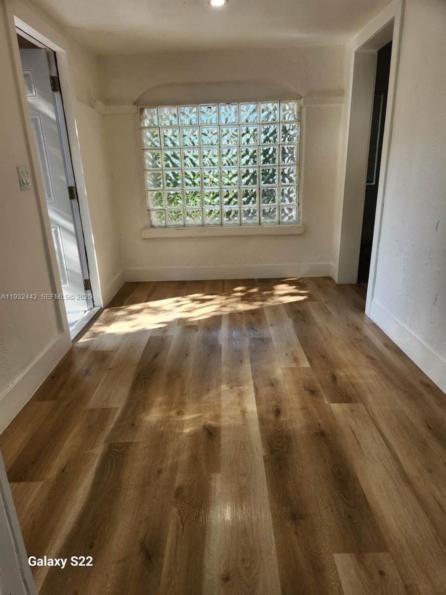 45 Northeast 60th Street Miami, FL 33137 - Photo 2 of 17 a view of an empty room with a window