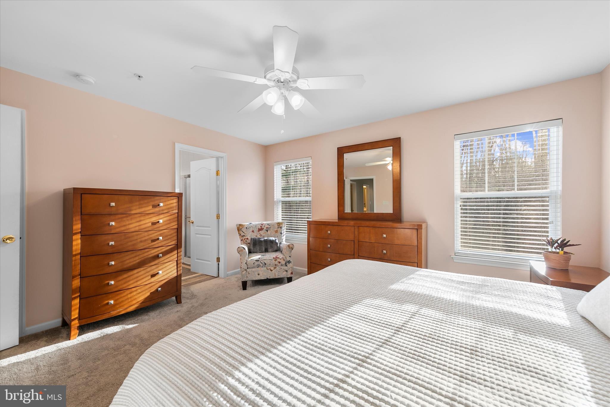 197 Intrepid Lane, Unit 1302 Berlin, MD 21811 - Photo 11 of 20 a bedroom with a bed and window