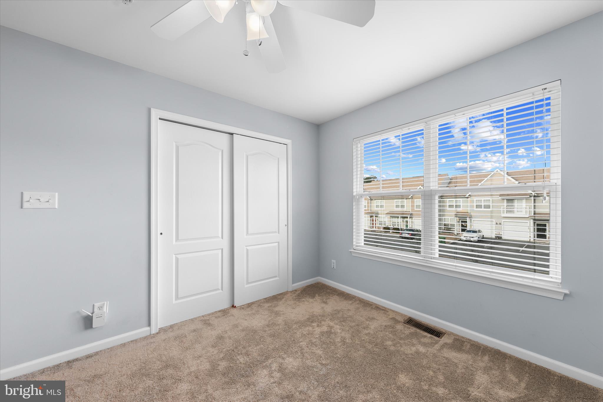 197 Intrepid Lane, Unit 1302 Berlin, MD 21811 - Photo 12 of 20 a view of an empty room with a window