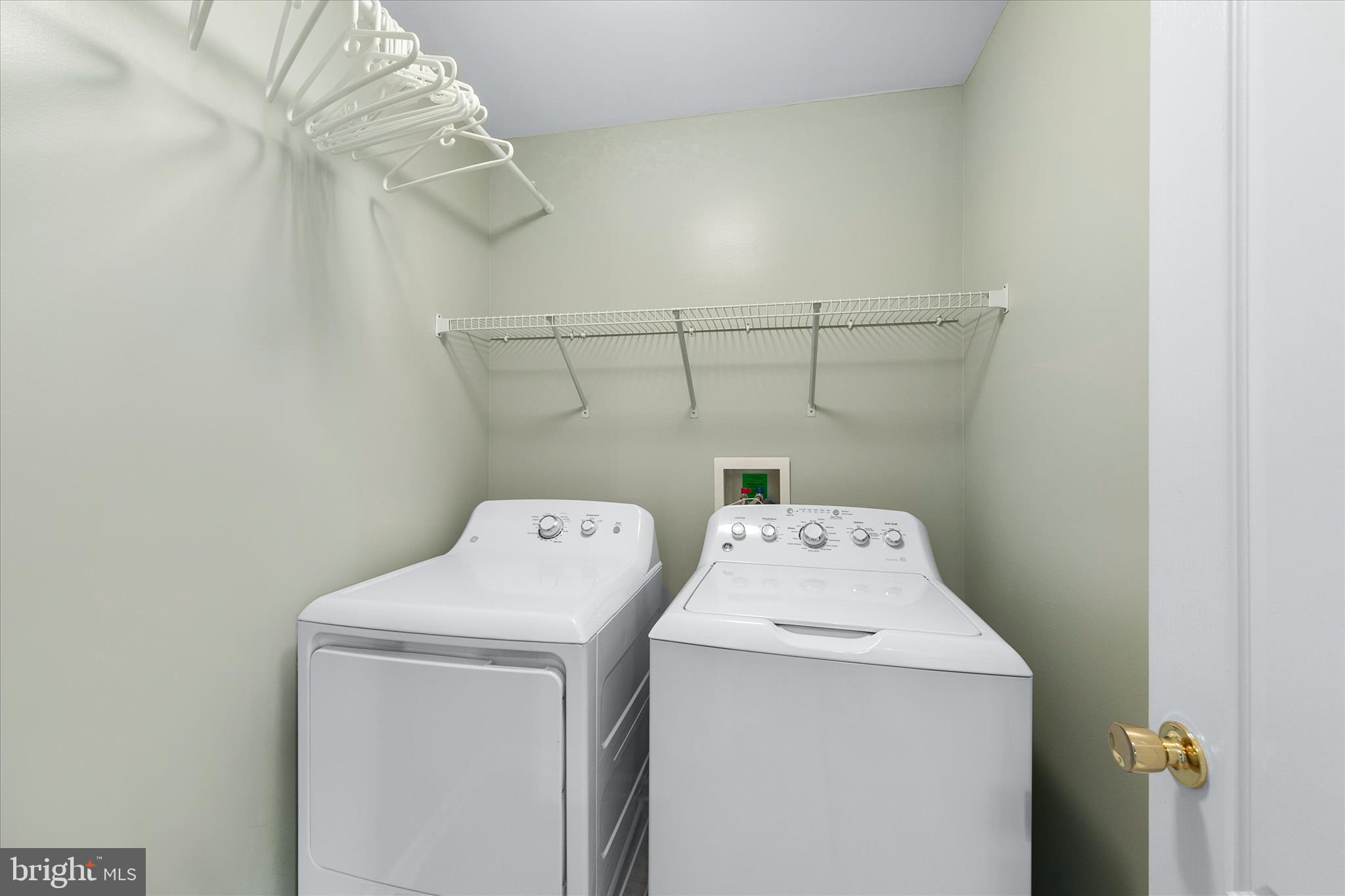 197 Intrepid Lane, Unit 1302 Berlin, MD 21811 - Photo 15 of 20 a utility room with dryer and washer