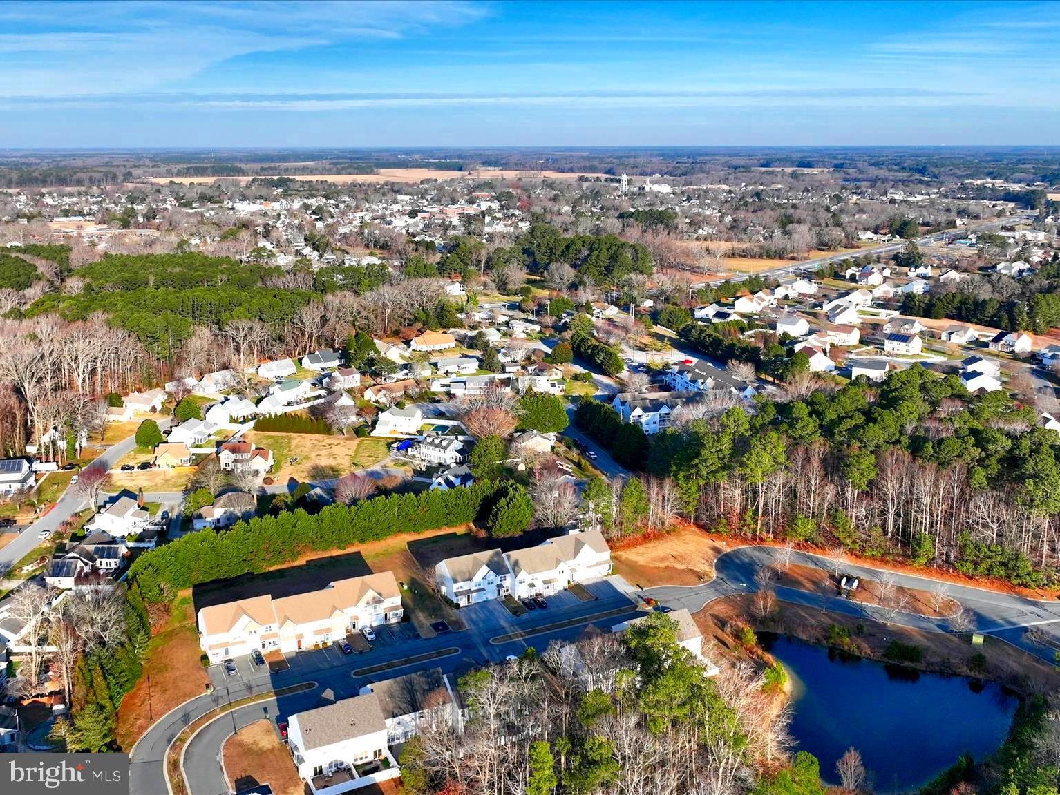 197 Intrepid Lane, Unit 1302 Berlin, MD 21811 - Photo 19 of 20 an aerial view of residential houses with outdoor space
