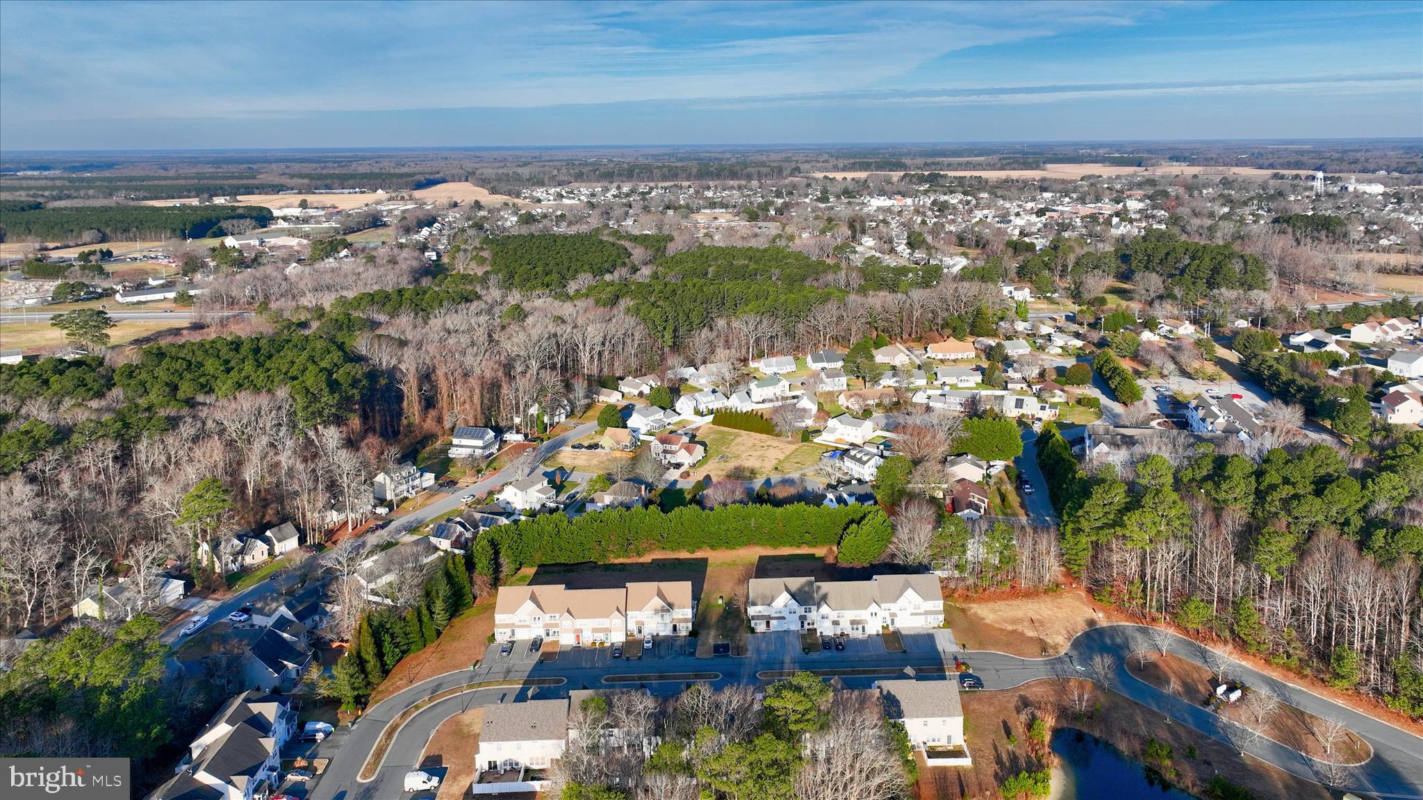 197 Intrepid Lane, Unit 1302 Berlin, MD 21811 - Photo 20 of 20 an aerial view of residential houses with outdoor space