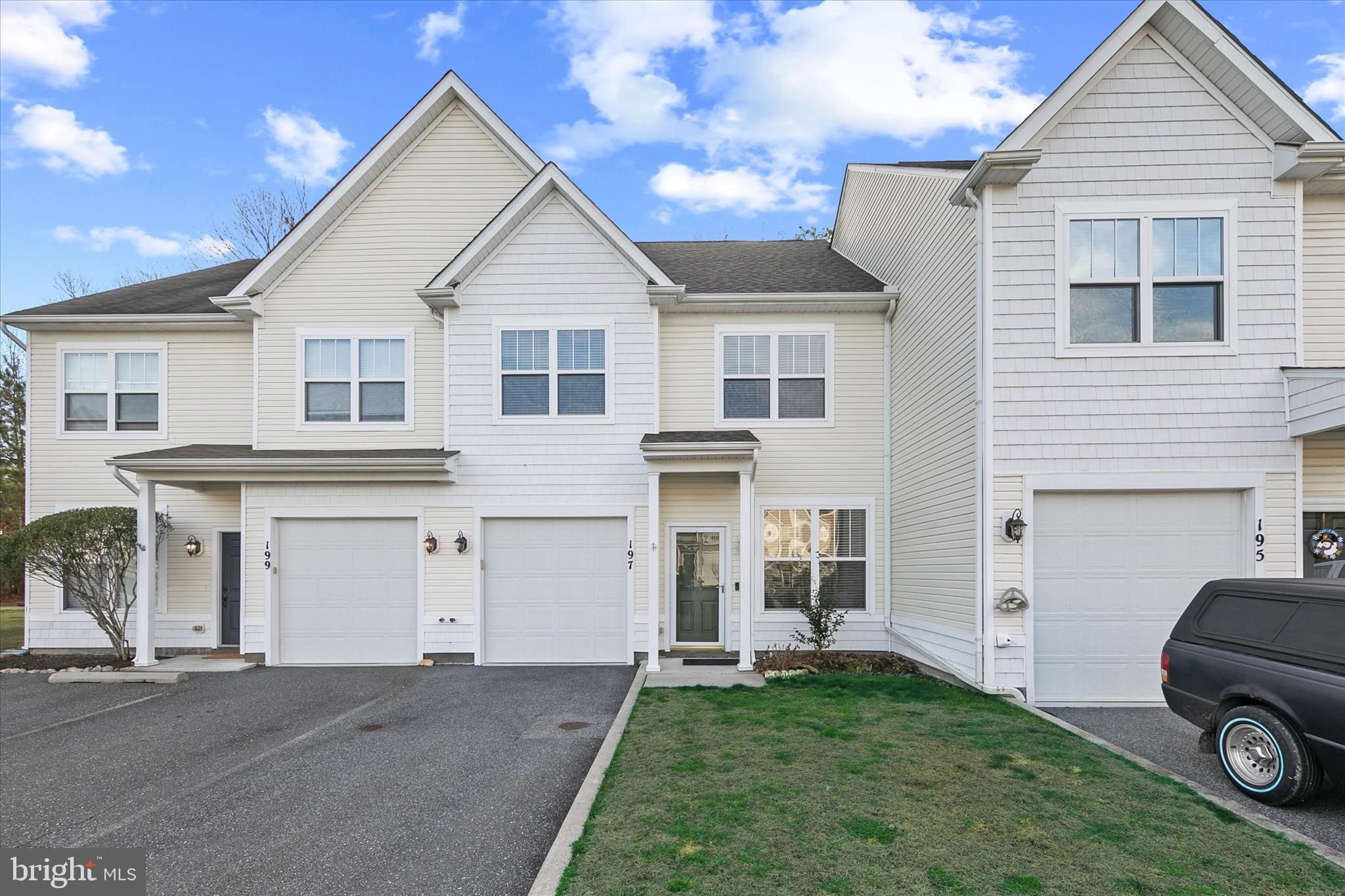 197 Intrepid Lane, Unit 1302 Berlin, MD 21811 - Photo 2 of 20 a house view with a garden space