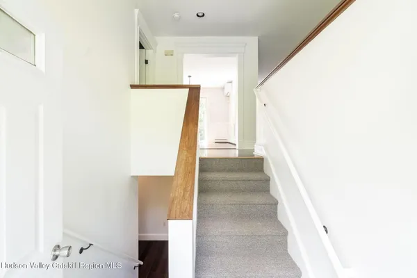 a view of entryway with furniture