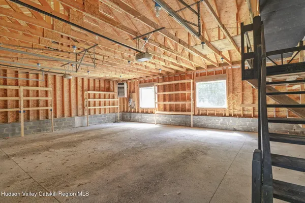a view of a house with a street