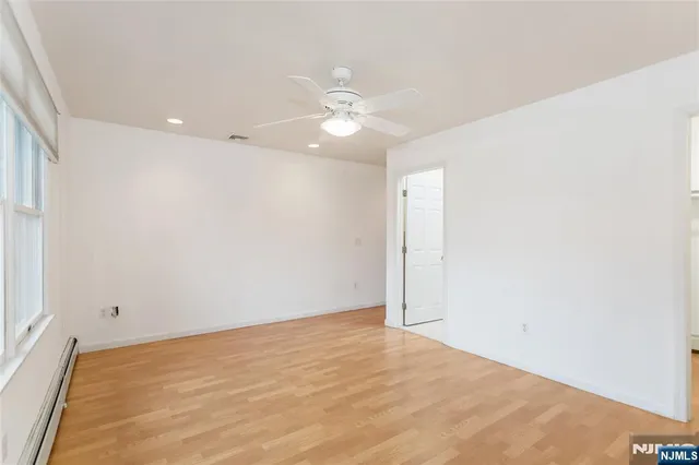 a view of a room with racks on the wall