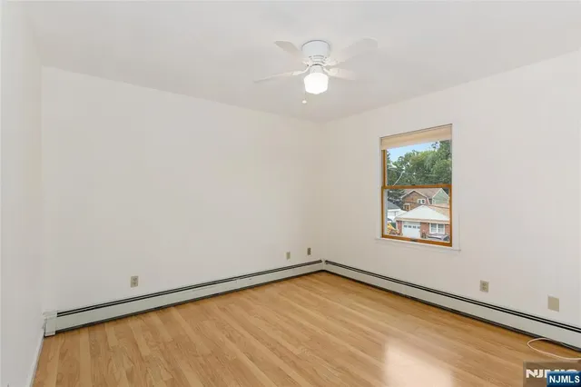 a bathroom with a toilet a sink and shower