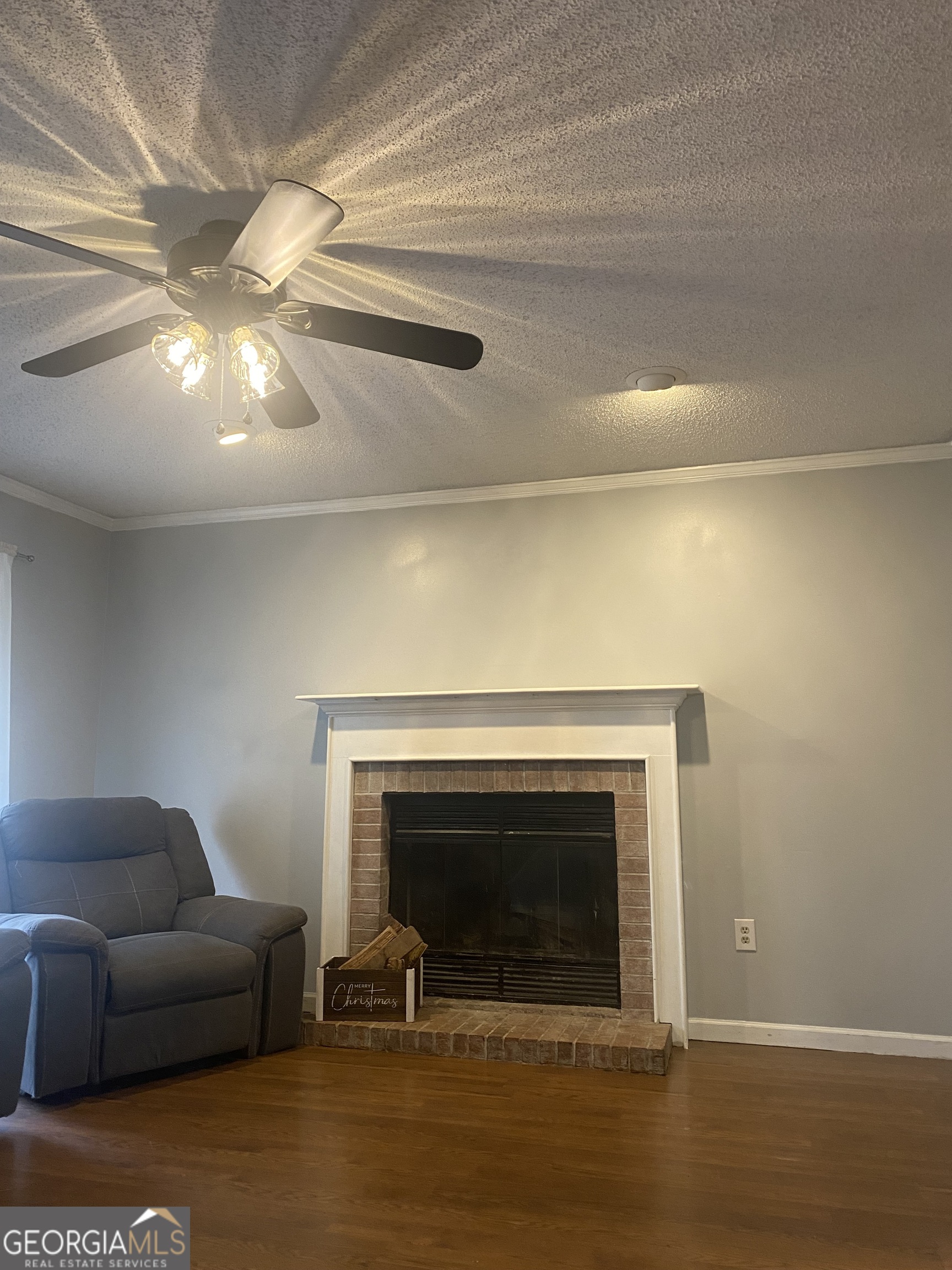 3104 Heritage Road Milledgeville, GA 31061 - Photo 2 of 7 a living room with furniture and a fireplace