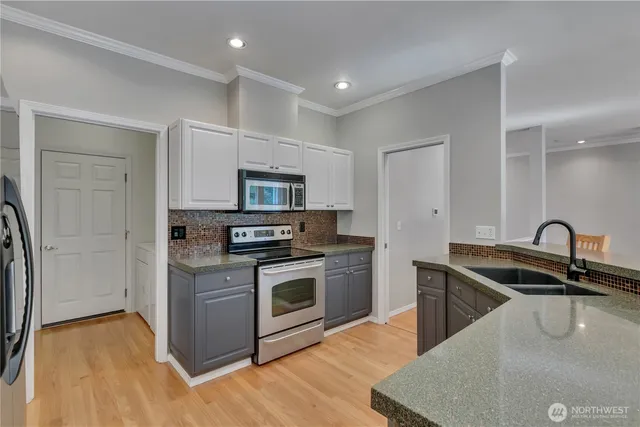 a kitchen with lots of counter space and a sink