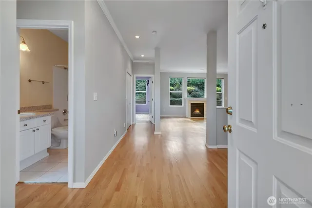 wooden floor with white walls