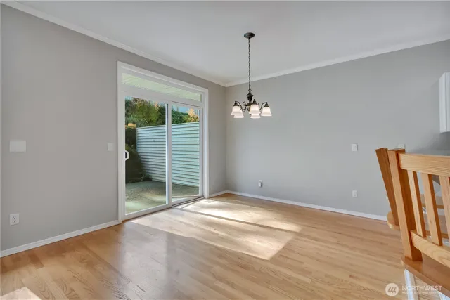 a view of kitchen with cabinets and stainless steel appliances