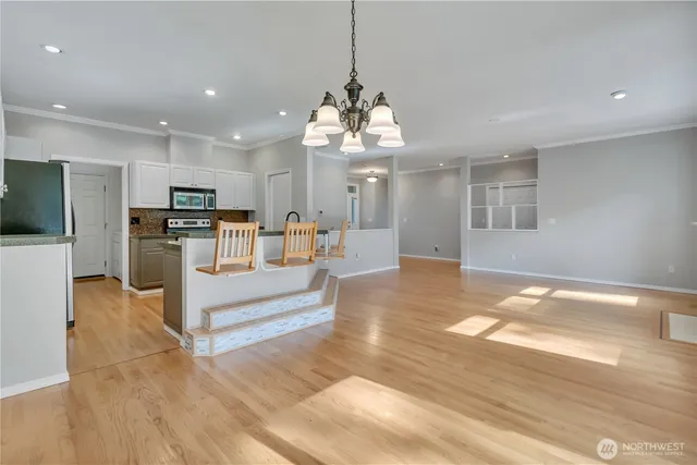 a view of living room with furniture and flat screen tv