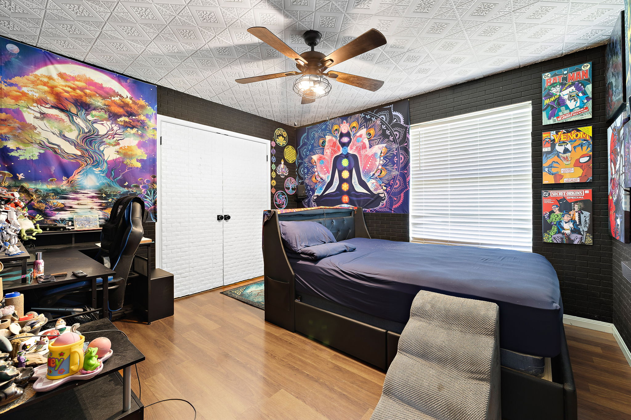 615 Runners Ridge Pflugerville, TX 78660 - Photo 25 of 32 a bedroom with furniture and a flat screen tv