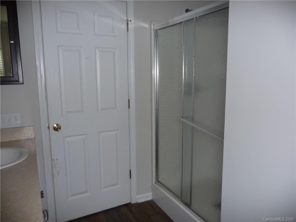 4222 Richardson Road Monroe, NC 28112 - Photo 17 of 21 a bathroom with a shower and a sink