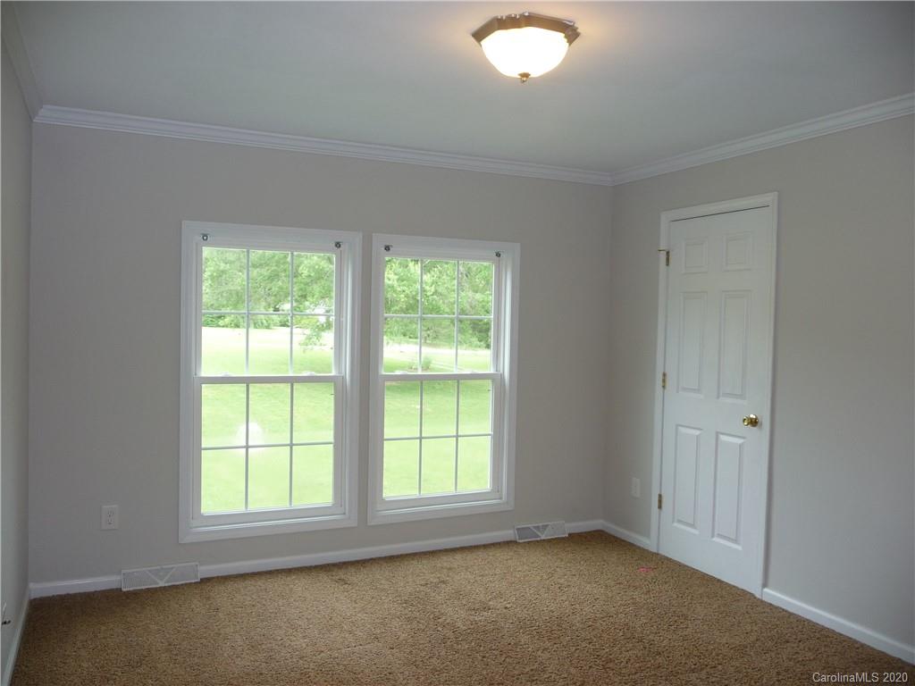 4222 Richardson Road Monroe, NC 28112 - Photo 10 of 21 an empty room with windows