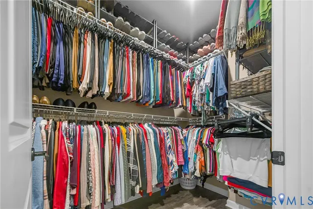 a bathroom with a sink a mirror and a shower