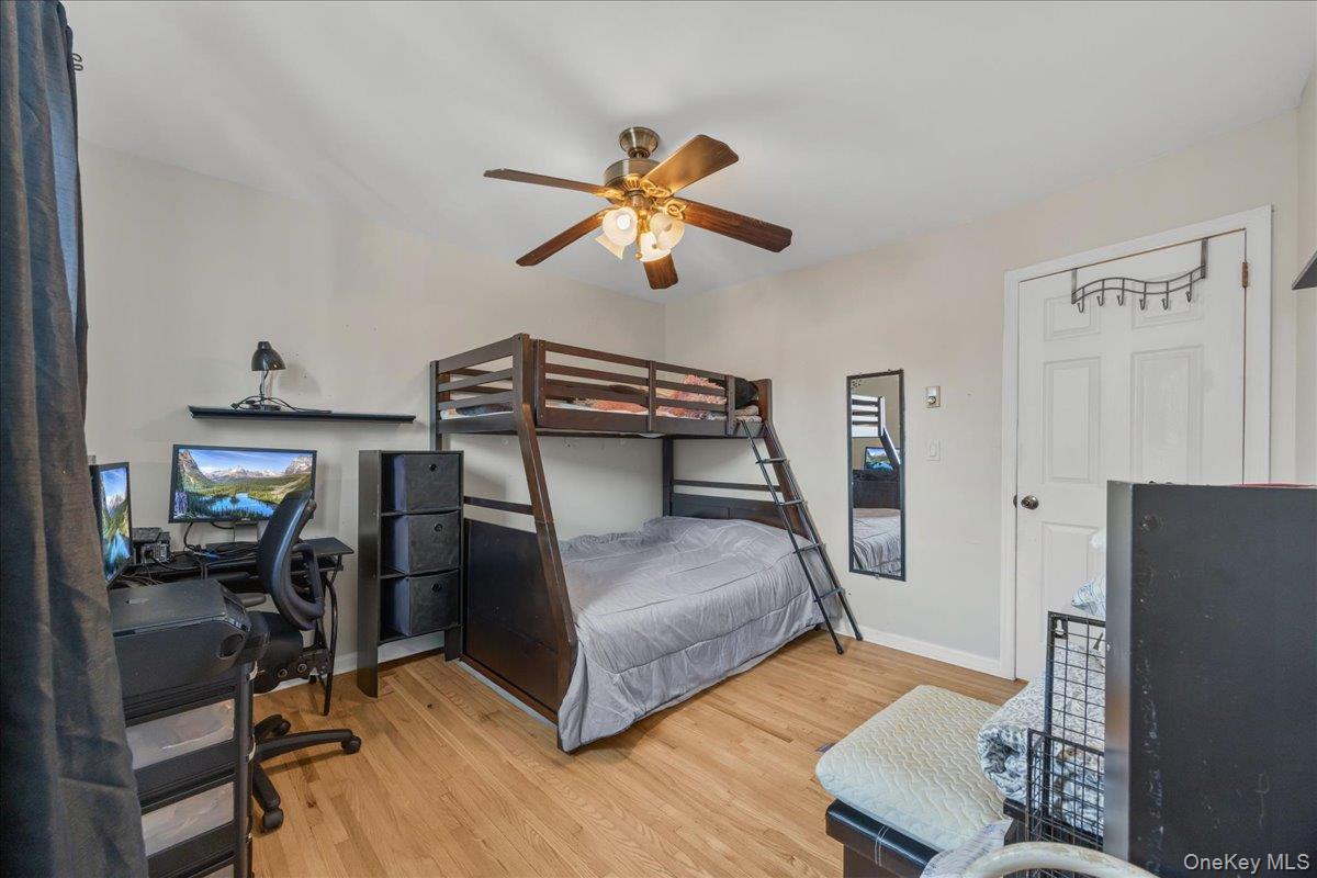 782 Tuckahoe Road, Unit 3C Yonkers, NY 10710 - Photo 16 of 19 a bedroom with furniture and a window