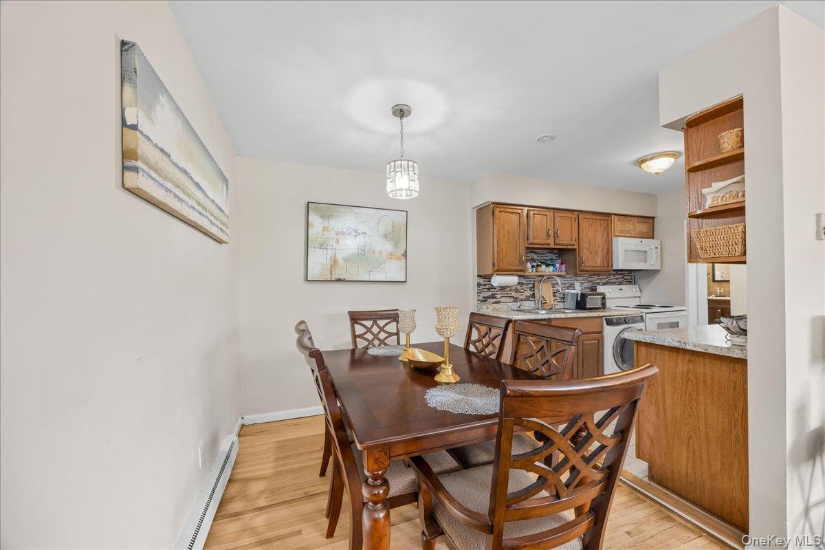 782 Tuckahoe Road, Unit 3C Yonkers, NY 10710 - Photo 7 of 19 a view of a dining room with furniture