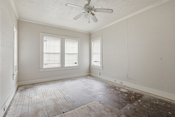 1655 Hawthorne Street Houston, TX 77006 - Photo 14 of 39 wooden floor in an empty room with a window