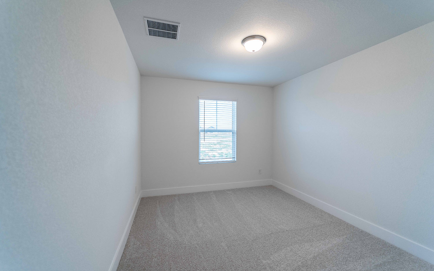 104 Old Silver Drive Jarrell, TX 76537 - Photo 16 of 19 Unfurnished room featuring light colored carpet and baseboards