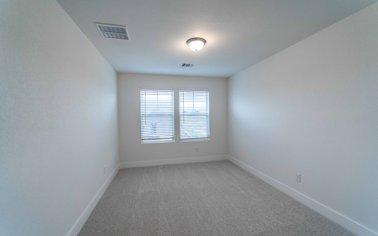104 Old Silver Drive Jarrell, TX 76537 - Photo 17 of 19 Spare room featuring light colored carpet and baseboards