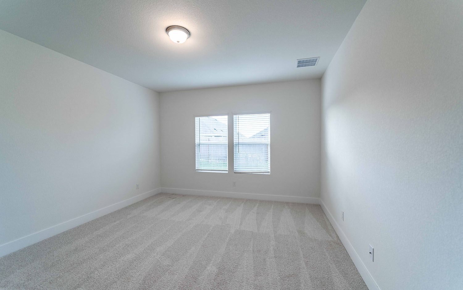104 Old Silver Drive Jarrell, TX 76537 - Photo 10 of 19 Spare room featuring light colored carpet and baseboards