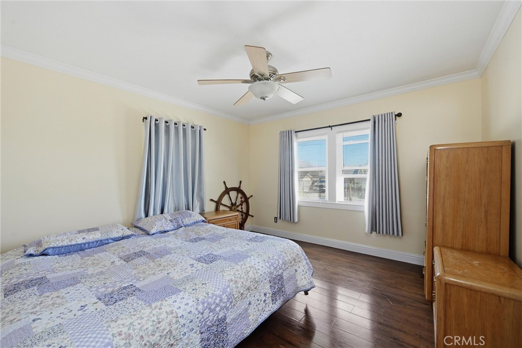 3440 Beach Nice, CA 95464 - Photo 11 of 27 a bed sitting in a spacious bedroom next to a window