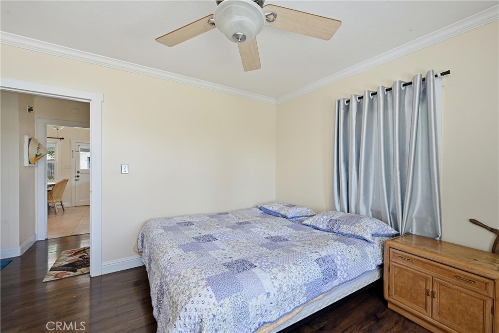 3440 Beach Nice, CA 95464 - Photo 12 of 27 a bedroom with a bed and wooden floor