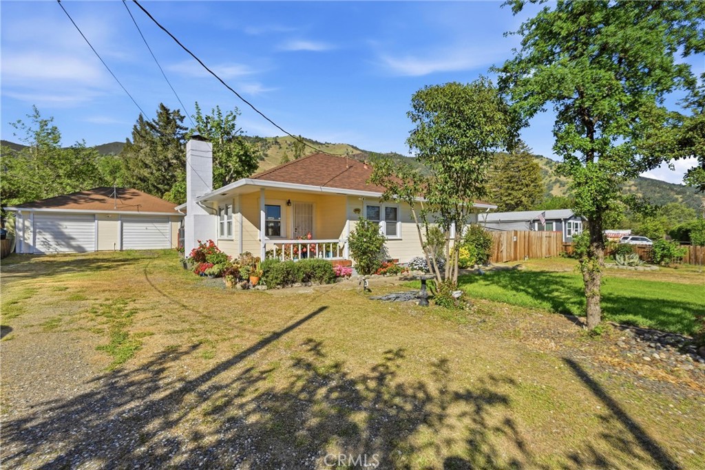 3440 Beach Nice, CA 95464 - Photo 16 of 27 a house with swimming pool in front of it