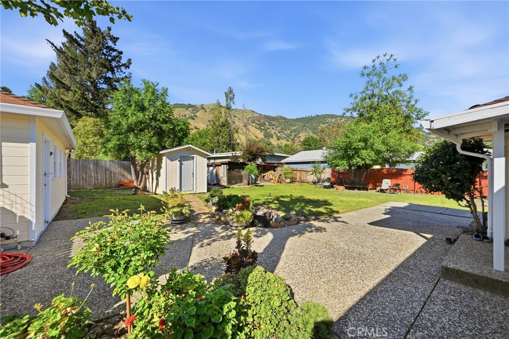 3440 Beach Nice, CA 95464 - Photo 26 of 27 a front view of a house with a yard