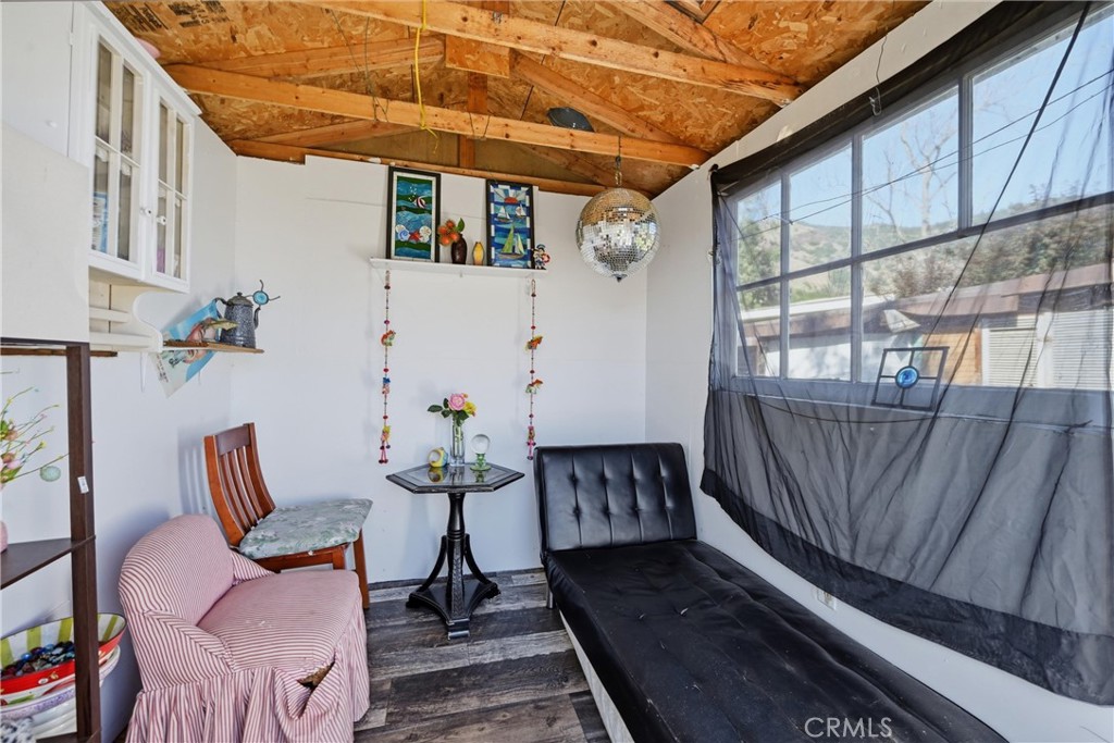 3440 Beach Nice, CA 95464 - Photo 27 of 27 a view of a balcony with chairs and a potted plant