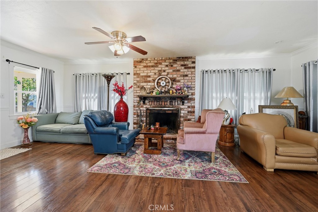 3440 Beach Nice, CA 95464 - Photo 5 of 27 a living room with furniture and a fireplace