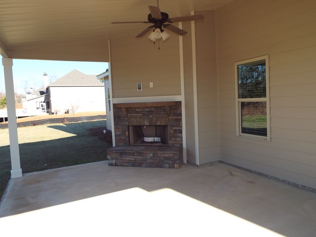 748 McKee Road Waverly Hall, GA 31831 - Photo 36 of 39 Outdoor fireplace/entertainment area