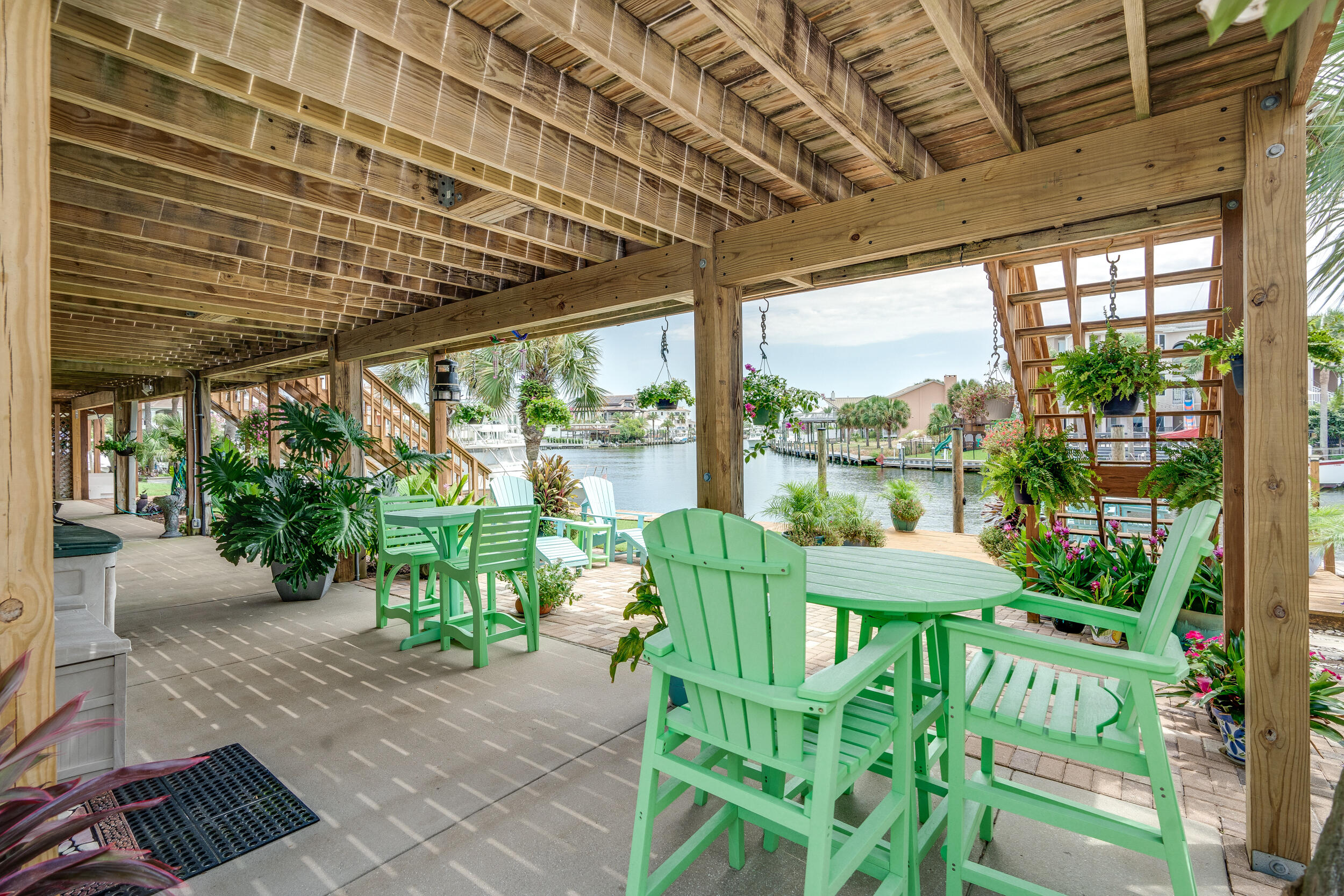153 Durango Road Destin, FL 32541 - Photo 4 of 51 a view of a porch with furniture and a yard